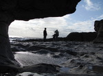 SX08623 Silhouettes of Matt, Jenni and Lib underneath rock.jpg